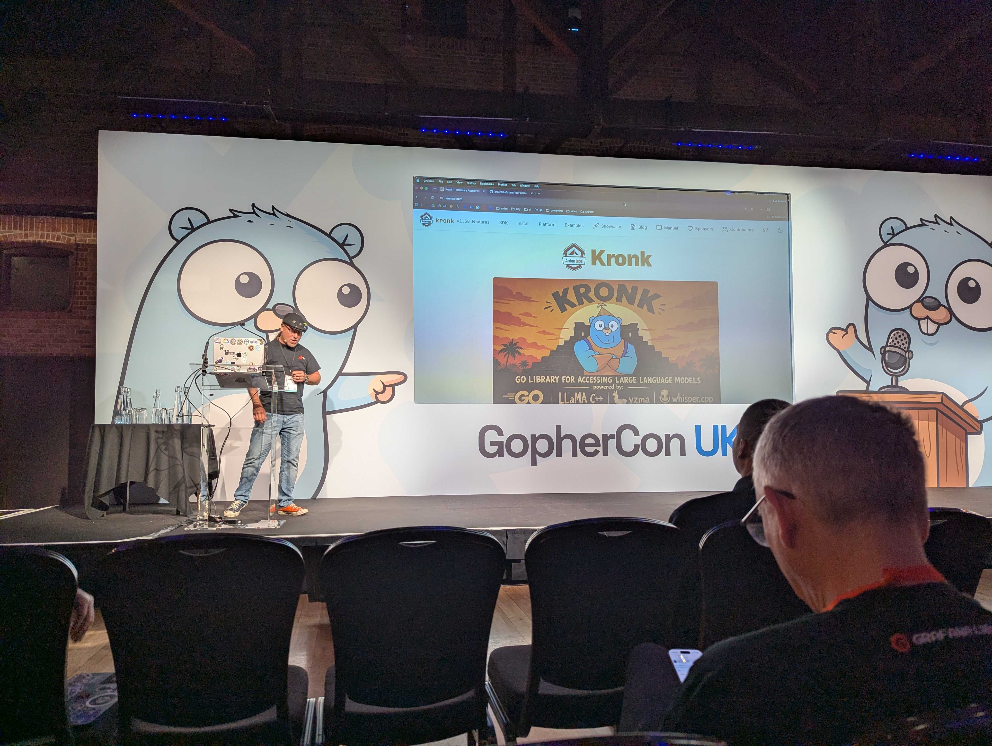 Bill Kennedy presenting Kronk at GopherCon UK 2026, with the Kronk website on screen