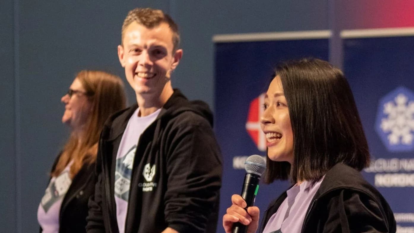 Kasper Nissen (center) on the main stage with Camilla (left) and Jinhong (right) to kick off the conference